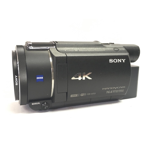 1921 - A boxed Sony 4K Handycam FDR-AX53. Postage category C