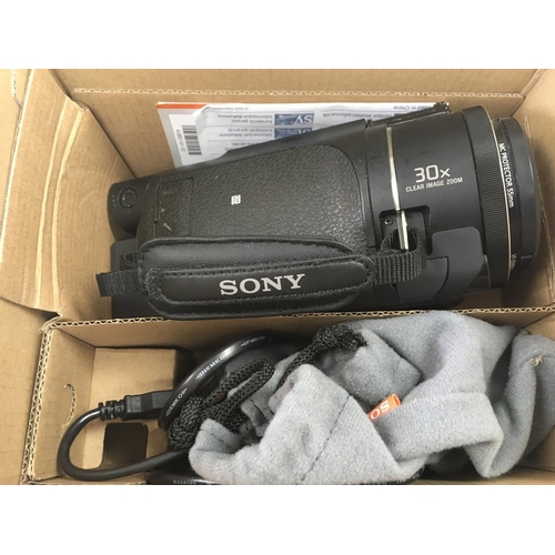 1921 - A boxed Sony 4K Handycam FDR-AX53. Postage category C