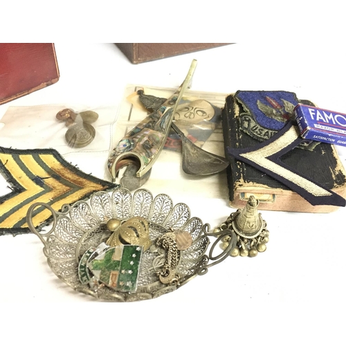 1924 - A collection of vintage compasses, military buttons, badges etc