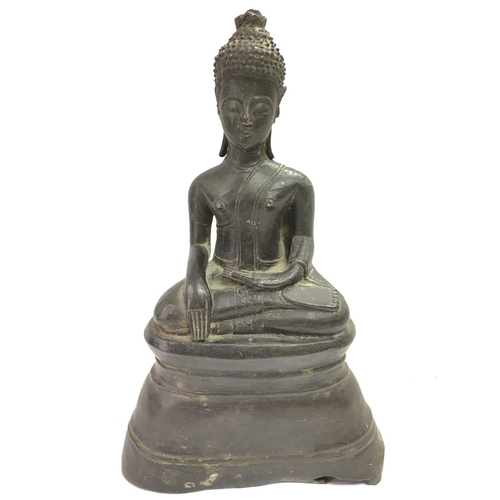 703 - A bronze thai buddah figure, 23cm tall. Postage category C