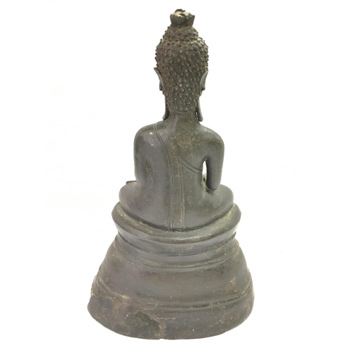 703 - A bronze thai buddah figure, 23cm tall. Postage category C