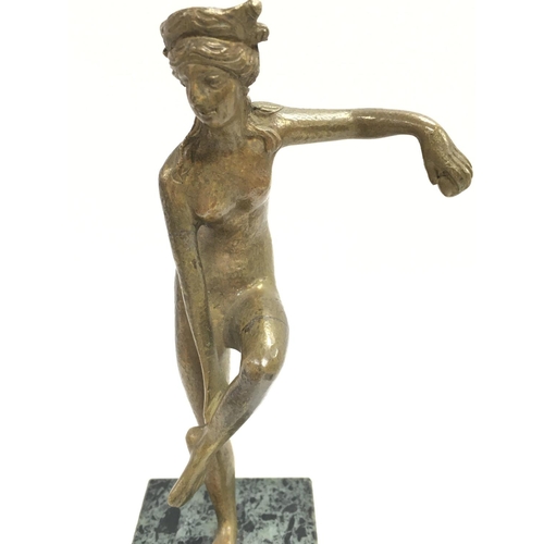 705 - A bronze Art Nouveau figure of a nude woman bather on a square green and black marble base, 21cm tal... 