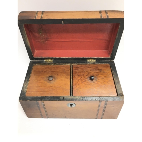 707 - A small inlaid wooden Georgian tea caddy, postage category C