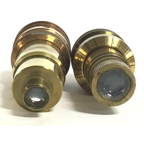 710 - Two cased brass 1/2 inch microscope lenses by J.B Dancer and Ross. This lot cannot be posted