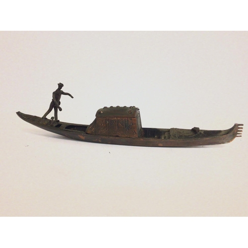 711 - Bronze Italian Gondola with Gondolier. 44cm long Postage category C. NO RESERVE