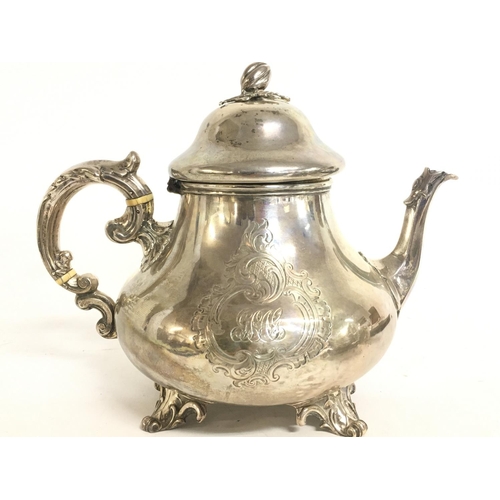 755 - A Victorian silver hallmarked tea pot, 20cm tall approximately. Postage category C