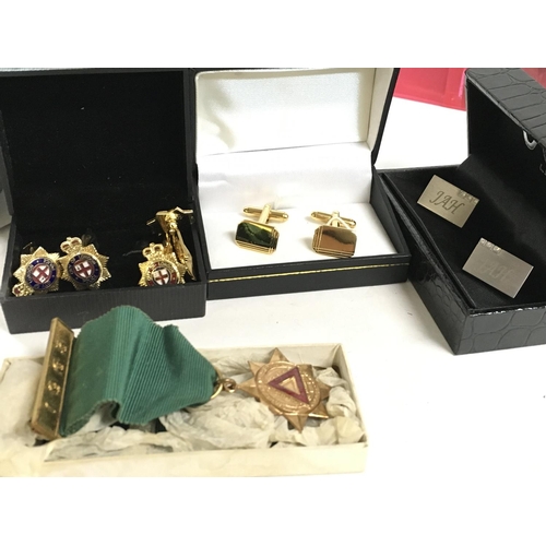 788 - A collection of cufflinks, pin badges, flasks, various British coins. Postage category C