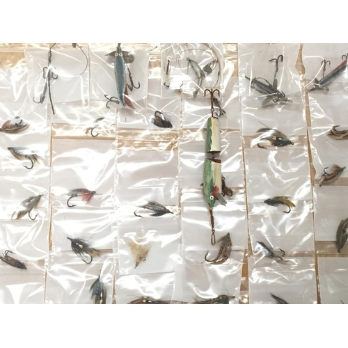 799A - A collection of Antique fly fishing flies and painted wood fishing lures presumed for pike fishing. ... 