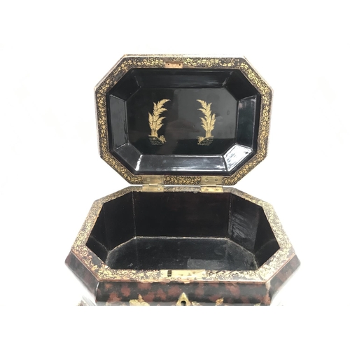 801 - A Chinese black lacquer box with gilt decoration and dragon head feet, dimensions 25x19x16cm approxi... 