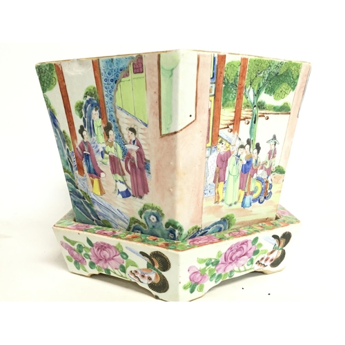 812 - A Qing Dynasty Chinese export mid 19th century Cantonese Famille rose jardinere and dish. This lot c... 