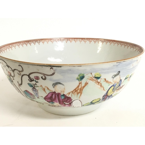 819 - A mid 18th century Chinese export Famille Rose bowl, some hairline cracks, chip as seen on the rim. ... 