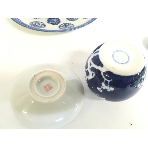 820 - A Japanese Imari bowl, Chinese Famille Rose dish, Chinese Blue and white ginger jar, Chinese blue an... 