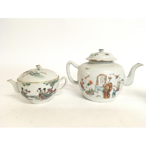 821 - 19th century Chinese export Famille Rose tea pots with character marks to the base. This lot cannot ... 