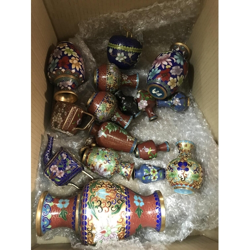 828 - A box containing miniature cloisonnÃ© vases and tea pots