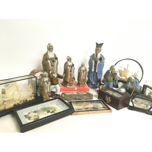 832 - A collection of modern Chinese figures and framed cork dioramas. This lot cannot be posted