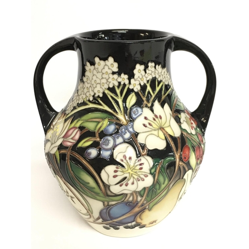 908 - A Moorcroft Nicola Slaney two handled vase , 17.5cm tall. No obvious damage or restoration, this lot... 