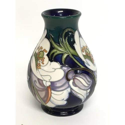 911 - A Moorcroft trial vase, 14cm tall. No obvious damage or restoration, this lot cannot be posted.