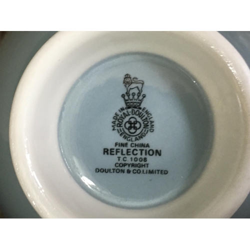 936 - A Royal Doulton Reflection tea set including cups, saucers, plates etc. This lot cannot be posted