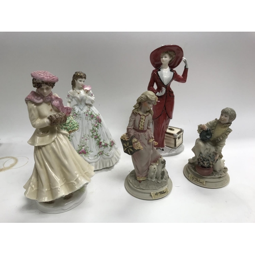 955 - A collection of Worcester and Coalport lady figures.