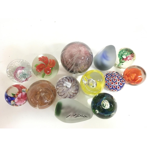 999 - A collection of paperweights, vintage eye baths, Caithness Boxed paperweights. This lot cannot be po... 