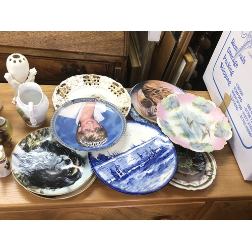 1136 - A collection of assorted ceramics including plates vases etc and a clock.
Postage D