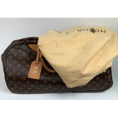 828 - A vintage Louis Vuitton travel case Eole 60 Monogram, with dust bag. (A)