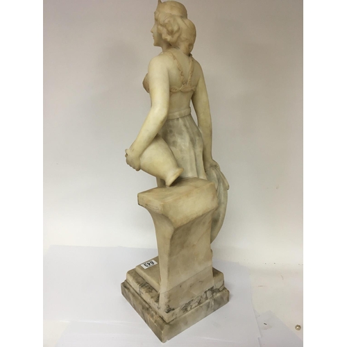 843 - A Quality Art Deco carved Carrera Marble figure a full length lady of Art Deco dress and with Neo cl... 