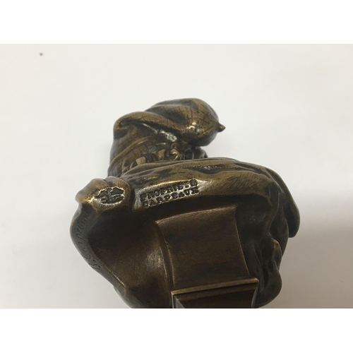 861 - A small French bronze bust mounted on a marble plinth. Height 17cm