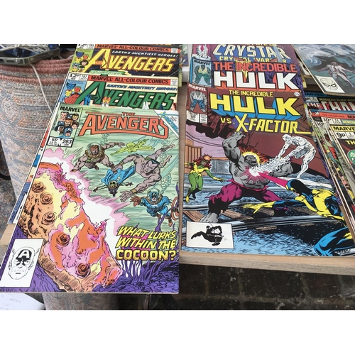 102 - A collection of approximately 50 Marvel comics with titles including..The Avengers..The Champions..M... 