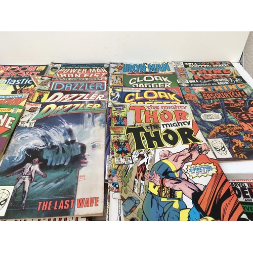 102 - A collection of approximately 50 Marvel comics with titles including..The Avengers..The Champions..M... 