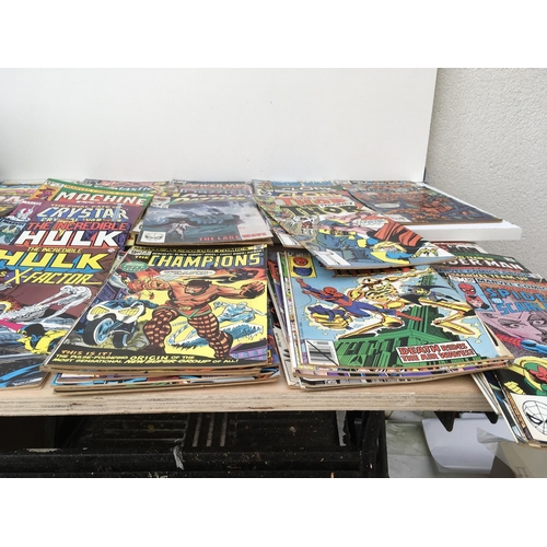 102 - A collection of approximately 50 Marvel comics with titles including..The Avengers..The Champions..M... 