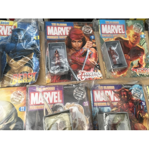 107 - A group of 25 Eaglemoss magazines in The Classic Marvel figurine collection numbers 1 to 25. With th... 