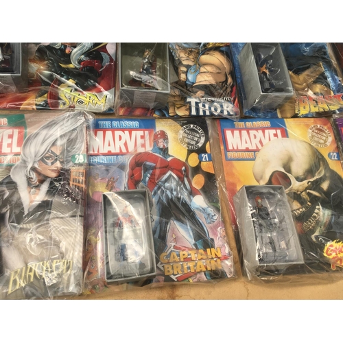 107 - A group of 25 Eaglemoss magazines in The Classic Marvel figurine collection numbers 1 to 25. With th... 