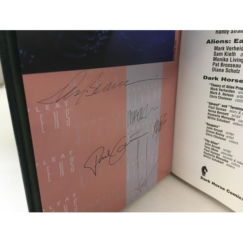 121 - A Signed limited edition Compleat Aliens book, number 287 of 500. Also a signed limited edition Alie... 