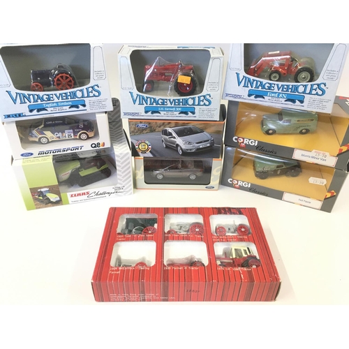 107 - A Collection of Boxed Diecast Including Ertl.Mini Champs. Corgi. Etc.