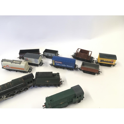 108 - A Box Containing a Collection of 00 Gauge Locomotives.Track And Wagons etc.