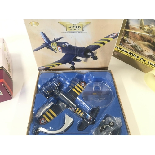 113 - 4x corgi aviation archive models. Including P-51D Mustang. F4U-7 Corsair. P-40 Warhawk. Focke-Wulf