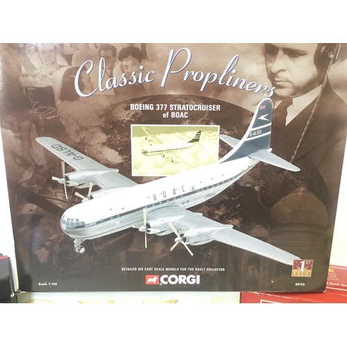 117 - 4 Boxed Corgi Aircraft. Including a Spitfire. A Mustang. A Boeing Stratocaster. Etc.