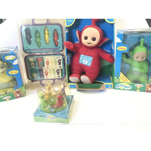 120 - A Collection of Boxed Teletuby Toys.