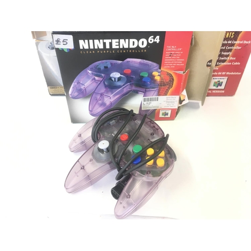 128 - A Boxed Nintendo 64 with Spare Controller and 2 Games including Golden Eye.