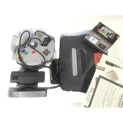 128 - A Boxed Nintendo 64 with Spare Controller and 2 Games including Golden Eye.