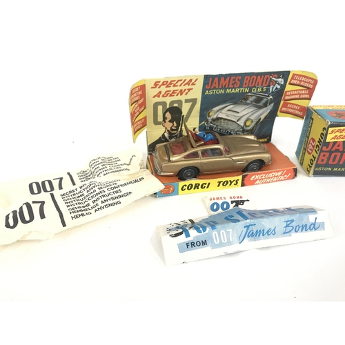 146 - A Boxed Corgi James Bond Aston Martin D.B.5 #261.