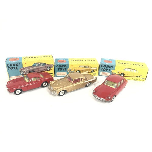 158 - 3 X Boxed Corgi Vehicles. A Volvo P.1800 #228. A Studebaker #2115 and a Citroen D.S.19 #2105.