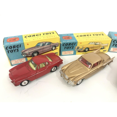 158 - 3 X Boxed Corgi Vehicles. A Volvo P.1800 #228. A Studebaker #2115 and a Citroen D.S.19 #2105.