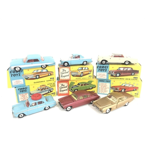 160 - 6 Boxed Corgi Vehicles. A Oldsmobile Super 88 #235. A Triumph Herald Coupe #231. A Mercedes-Benz 220... 