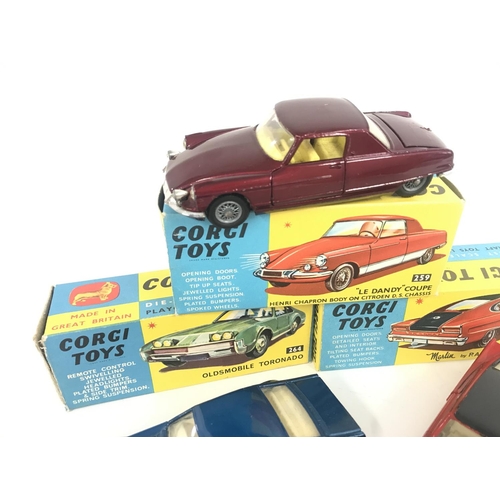 164 - 3 X Boxed Corgi Vehicles. A Le Dandy Coupe #259. A Oldsmobile Tornado #264 and a Marlin By Rambler #... 