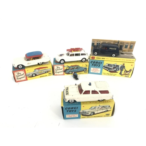 166 - 4 Boxed Corgi Vehicles. A Bermuda Taxi #430. A Citroen Safari #475 a Police Van (no Dog of police ma... 