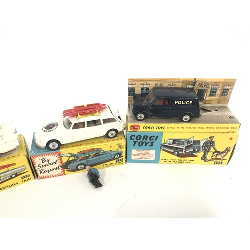 166 - 4 Boxed Corgi Vehicles. A Bermuda Taxi #430. A Citroen Safari #475 a Police Van (no Dog of police ma... 