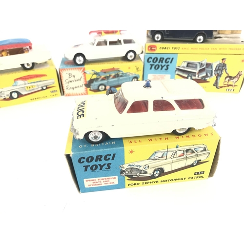 166 - 4 Boxed Corgi Vehicles. A Bermuda Taxi #430. A Citroen Safari #475 a Police Van (no Dog of police ma... 