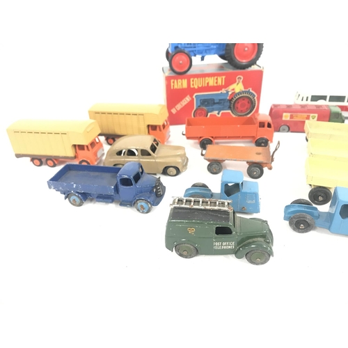 193 - A Collection of Playworn Diecast. Including Budgie. Dinky. And a Boxed Cresent Toys tractor